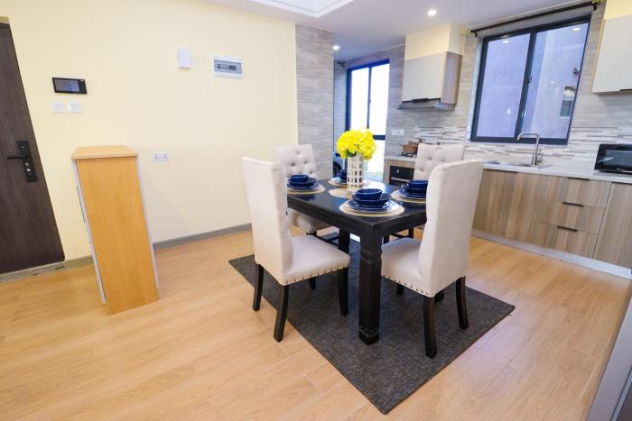 luxurious two bedroom apartment with well equipped gym,heated swimming pool, ample parking space and a relaxing rooftop with amazing city views