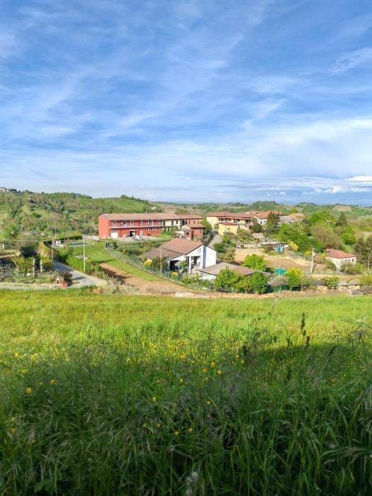 Appartamento con piscina - I Versanti Apartment