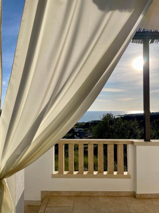 CASA MELODIA - immersa negli uliveti con vista sul mare Ionio