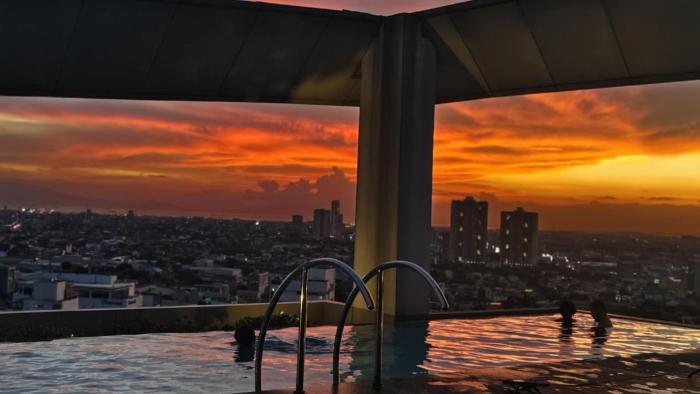 Deluxe One Bedroom Suite by Christine Suites infront of Trinoma Mall