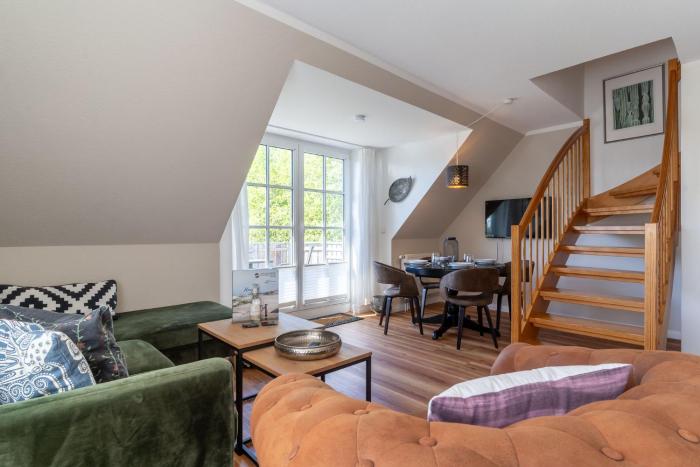 Ferienhaus Süderpiep – 4 individuelle Ferienwohnungen nahe Südstrand Ferienwohnung Möwe – stilvolle Maisonette für bis zu 4 Personen