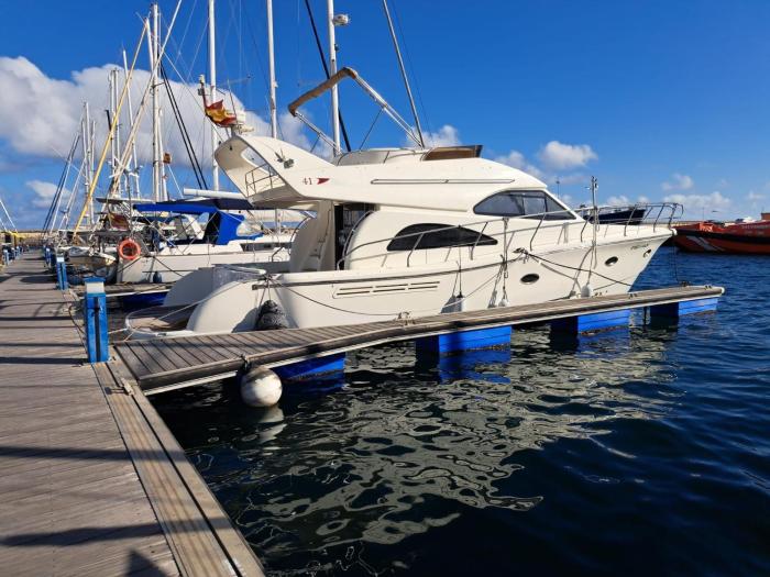 Yacht Experience Tenerife 24h plus Tour with private Skipper & private Hostessinclusive with Cocktails, Sandwiches, free Minibar and free islandwide pick-up and return in a Tesla S Sportscar