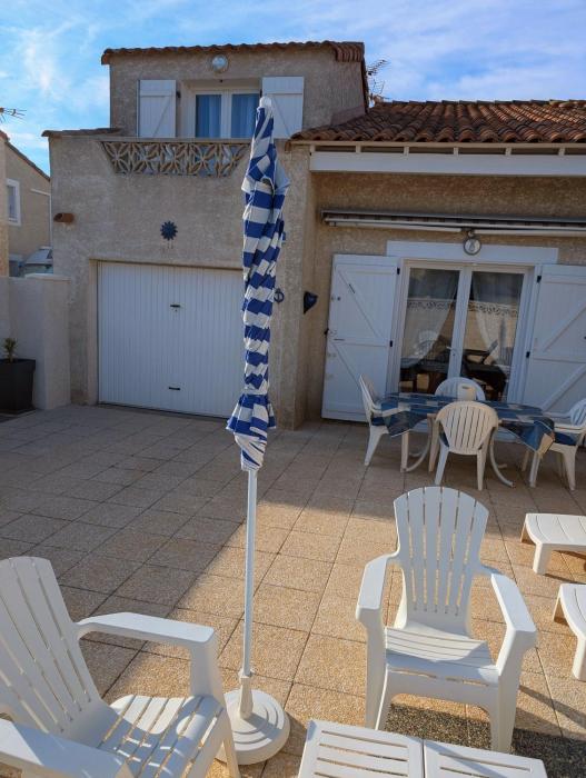 Maison de vacances climatisée 600m de la mer Cour privative et parking