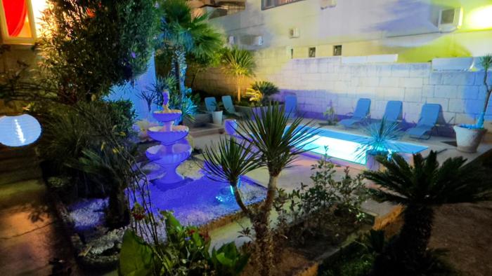 Beach Villa Apartment on top location, with pool, sea view and exotic garden