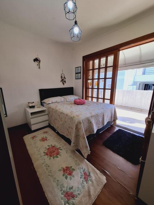 Quarto familiar na cidade do Cristo