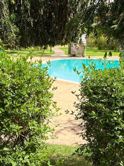 A Cosy Maison avec un accès direct à la piscine