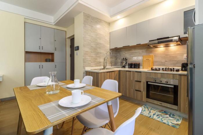 luxurious two bedroom apartment with well equipped gym,heated swimming pool, ample parking space and a relaxing rooftop with amazing city views