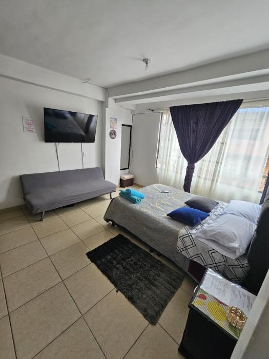 Acogedor apartamento cerca al aeropuerto y embajada americana y conecta