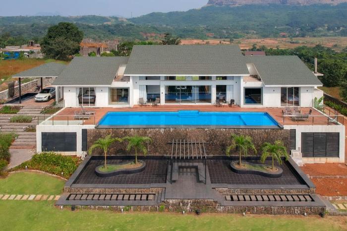 StayVistas Villa 107 at Canary Farms - Pure Veg with Huge Lawn, Pool and Home Theatre