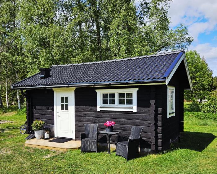 Mysig timmerstuga på dalagård