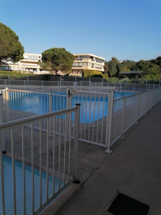 air-conditioned apartment with pool plus beach shuttle