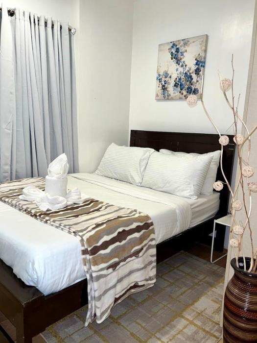 2BR Condo in Ecoland Minutes to SM City