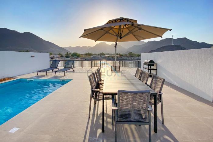 Facing Arabian Gulf and Mountain 4BR Villa and Assistant Room with Outdoor Pool and BBQ Space, Al Dana Island, Fujairah by Deluxe Holiday Homes