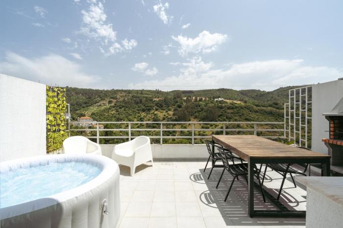 Sunny Flat w Jacuzzi & Balconies by Host Wise