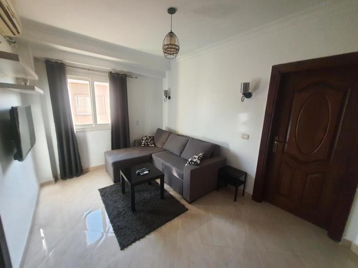 A stylish cozy apartment close to Cairo airport.