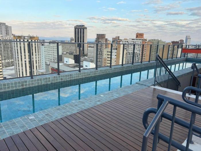 Estúdio AP no centro com piscina