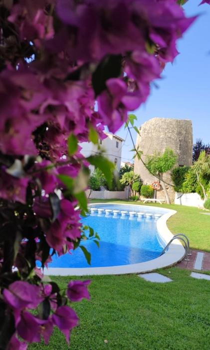 Acogedor adosado con piscina