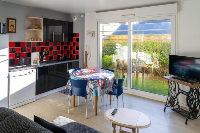 Appartement avec jardin et plage