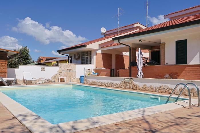 Villa Lella - Pantheon basement apartment, shared swimming pool 5 minutes from the sea, suitable for families or groups for complete relaxation