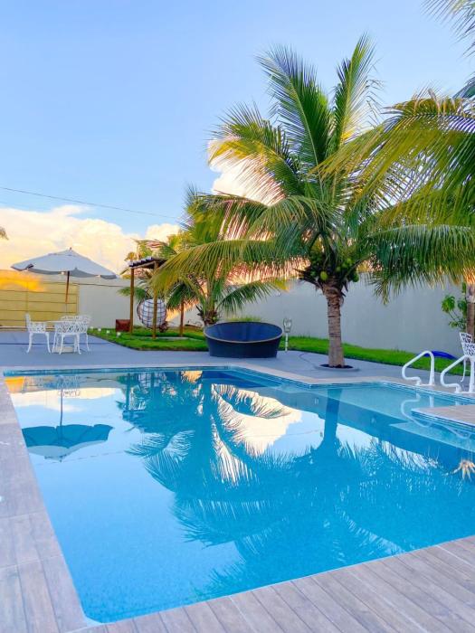 A Casa Paradisiaca l Luxo Piscina Super Hiper Quente 60 Graus Aquecimento Elétrico e Piscina Enorme com Roupa de Cama e Banho , Lareira, Ofurô Grande e Super Quente e Aceitamos PET , Com Valores Adicionais