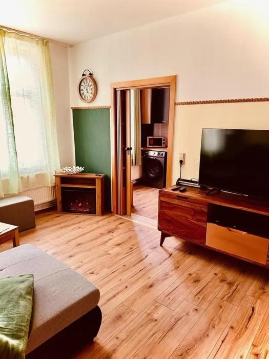 Haus HarzZauber - Elegantes Ferienquartier in der Altstadt mit Terrasse, Kamin und E-Bikes für die perfekte Auszeit