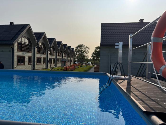 Domki Gala- blisko plaży, basen z podgrzewaną wodą , sauna , parking