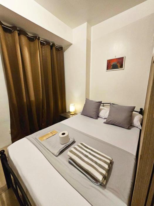 Cozy 1BR beside MOA with Wifi, Netflix, Pool & Washer