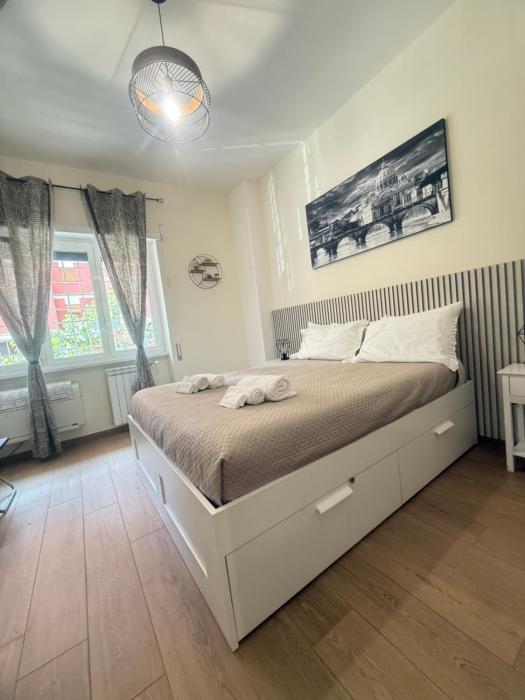 Casa Blaserna nel Cuore dello Shopping a Marconi e Trastevere