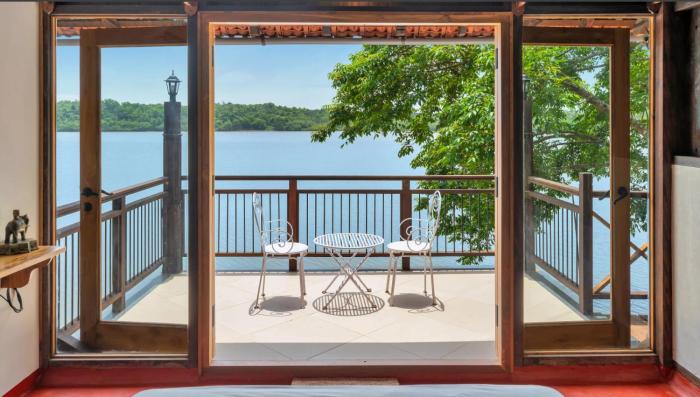 SaffronStays Suvarna Sangam riverfront villa with boat rides, candlelight dinners & backwater views in Udupi