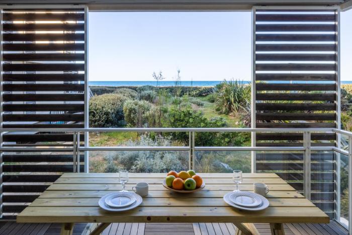 appartement 1ère ligne avec parking et terrasse vue mer