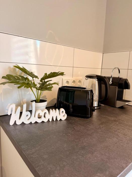 Appartement 2 - Gemütliche Wohnung mit Küchenzeile, Bad und großer Terrasse