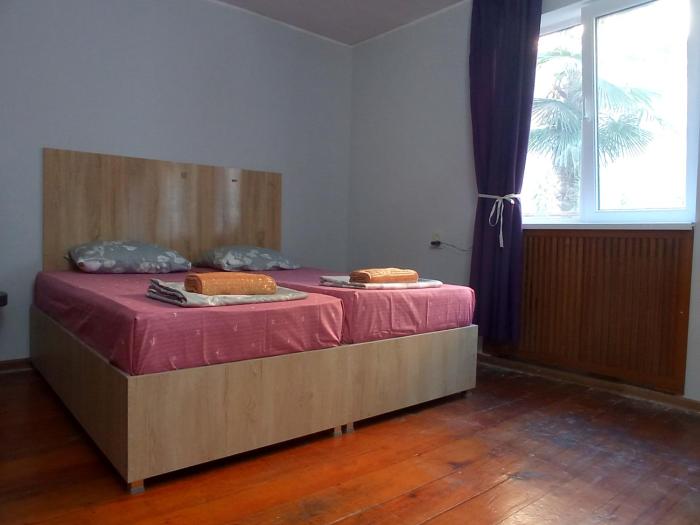 large bedroom with two separate beds