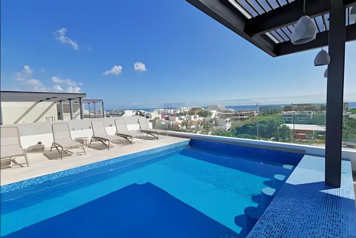 Apartamento de diseño bohemio de 2 dormitorios con enorme piscina en la azotea