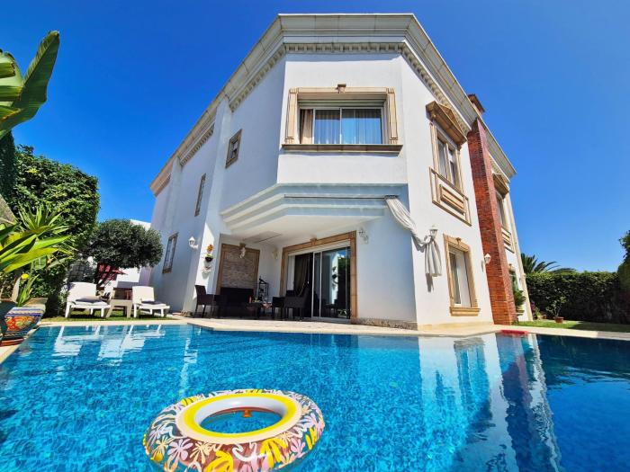 LOrchidée - Villa de luxe avec piscine chauffée, ascenseur privatif et vue sur le lac de Tunis