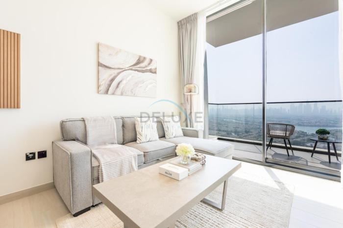 High-Floor 1BR with Balcony Overlooking the Lake, Minutes from the Park, Binghatti Onyx, Jumeirah Village Circle by Deluxe Holiday Homes