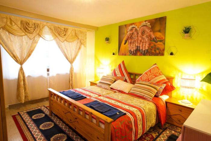 Stilvolles und Kunstvolles Retreat Apartment mit 400qm Garten & Massage und Ayurveda