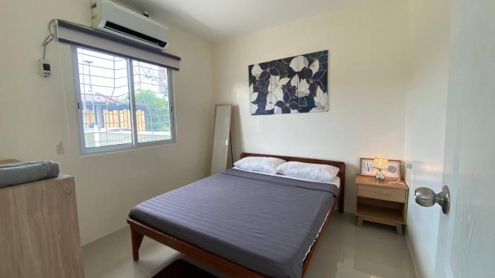 Peaceful 2BR Home in GenSan - AC, WiFi, Netflix, Patio Free Parking