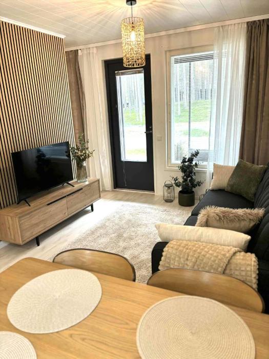 Luhtitalon päätyhuoneisto saunalla - Liinavaatteet,pyyhkeet ja loppusiivous sisältyvät aina majoituksen hintaan