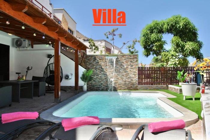 Villa Puerto Rico in front of the shopping center with private heated saltwater pool with jacuzzi & t able fút boll & arcade games OR St andard Villa Puerto Rico in front of the shopping center with private heated saltwater big jacuzzi & arcade game