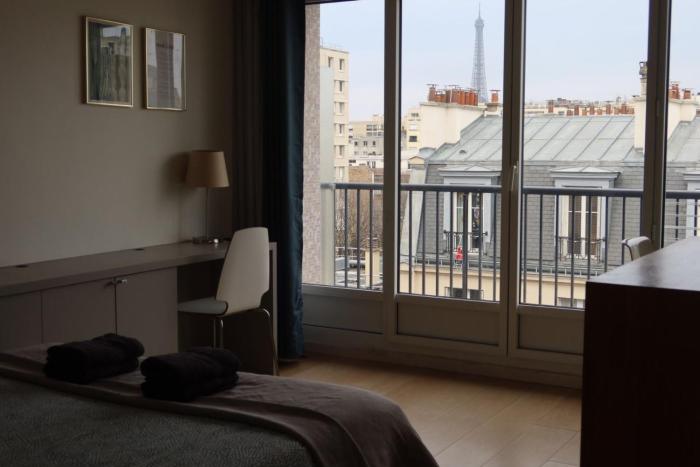 Central Paris apartment with Eiffel Tower view