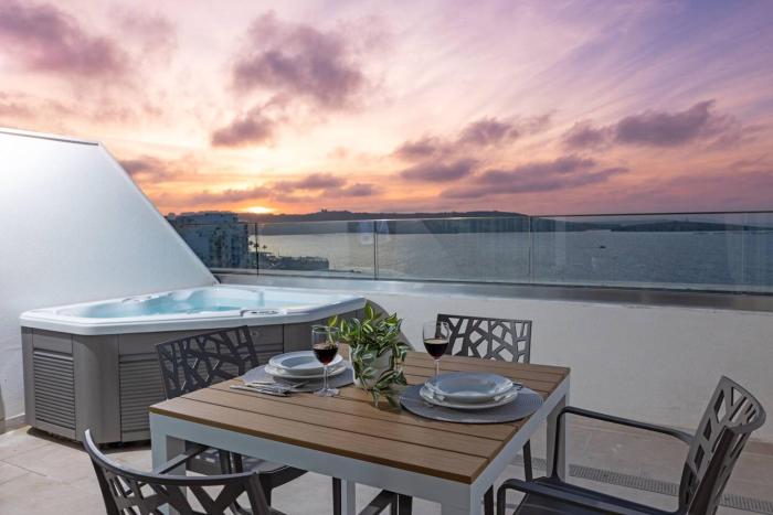 Ivory Suites Penthouse w hot tub by Homely!