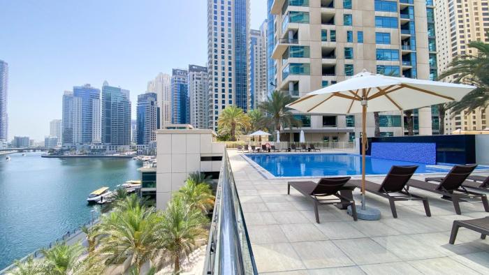 Sky High luxury Stay in Dubai Marina ,with Marina View, High Floor, Modern Design, Pool Access by Stay Vista! Up to 6 Guests