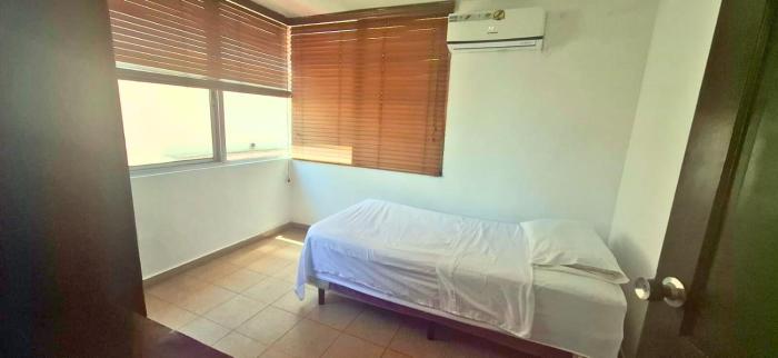 Habitación con Aire acondicionado en Hogar Familiar