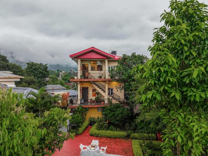 Riva Dreams 2-BHK Retreat with Hill Views & Lush Garden