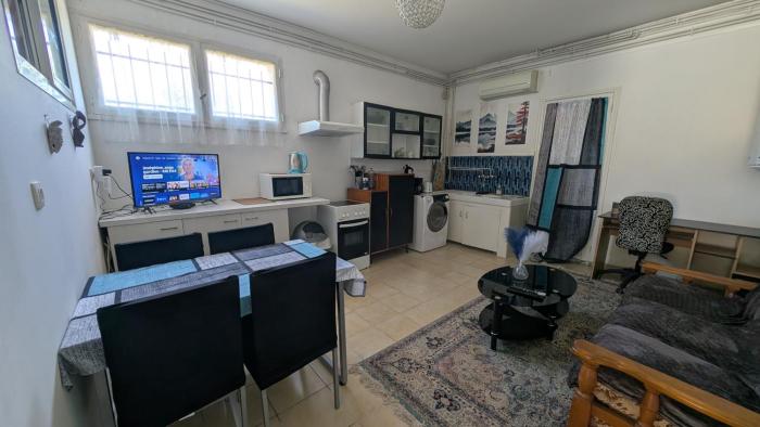 Appartement avec jardin centre village avec accès PMR