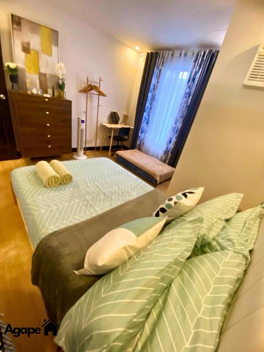 Neat and Fresh Fast Wifi with Pay parking PH Arena condo