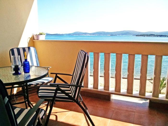 Apartment ANTONELA just 10 m from the Beach & Stunning Sea View & Free Private Parking