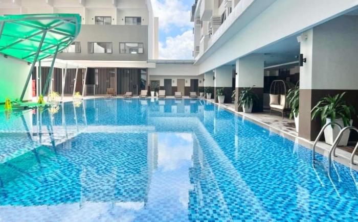 MY Modest Condo with Balcony near IT Park Cebu - Pool, Gym, Sauna