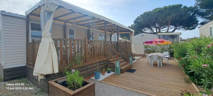 Mobil home neuf 40 m2 - 2 chambres - 100 m plage et belle vue sur la lagune et les Pyrénées