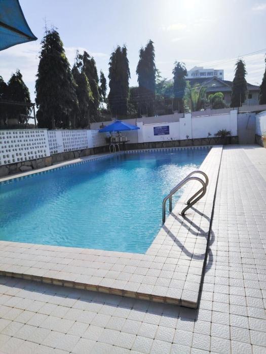 Coastal Bliss 1BR Nyali, pool, WiFi, walk to the beach